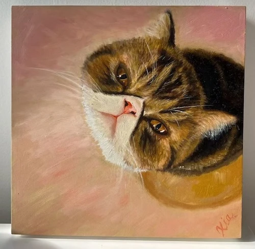 Painting of a tabby-and-white cat looking up, on a warm pink ground